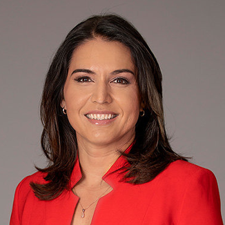 https://amchamcolombia.co/wp-content/uploads/2025/01/Tulsi-Gabbard.png